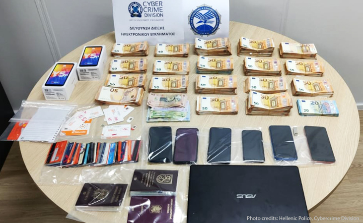 Large amount of money seized, passports, laptop, mobile phones.
